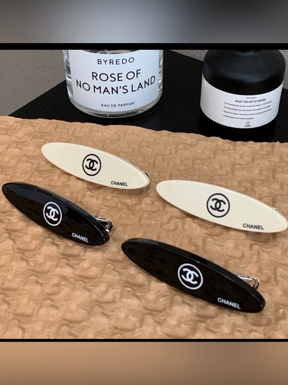 CHANEL Black and Cream Oval Logo Cufflinks Set